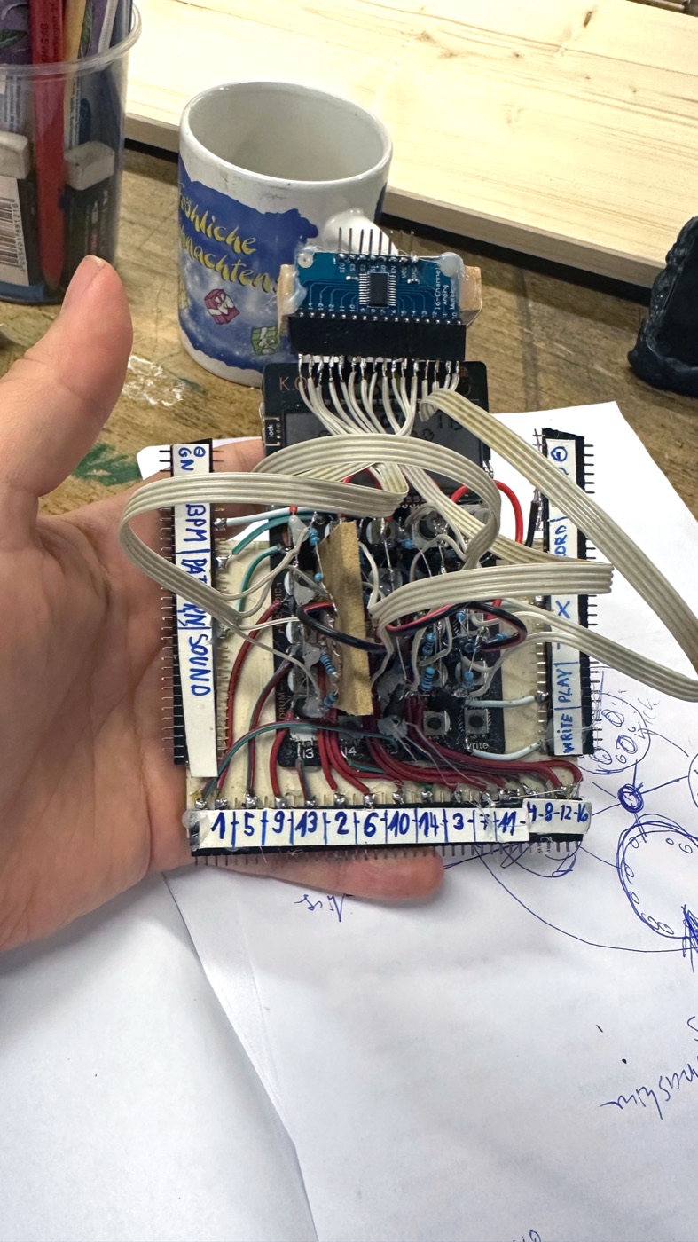 A hand-wired board with labelled connections